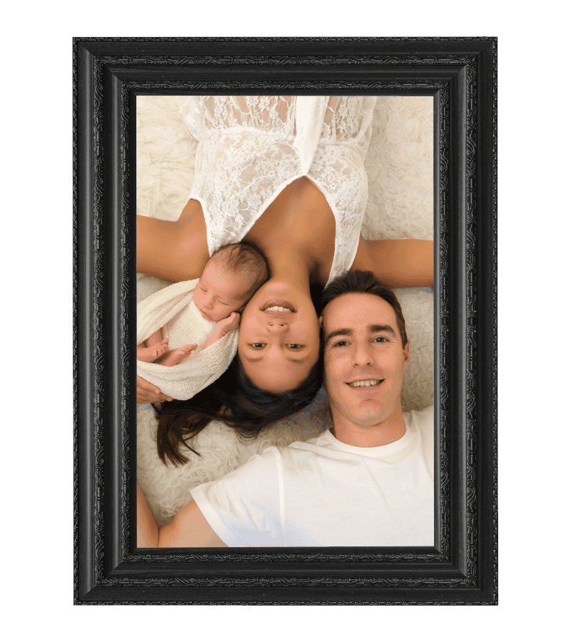 Couple lying on soft surface.